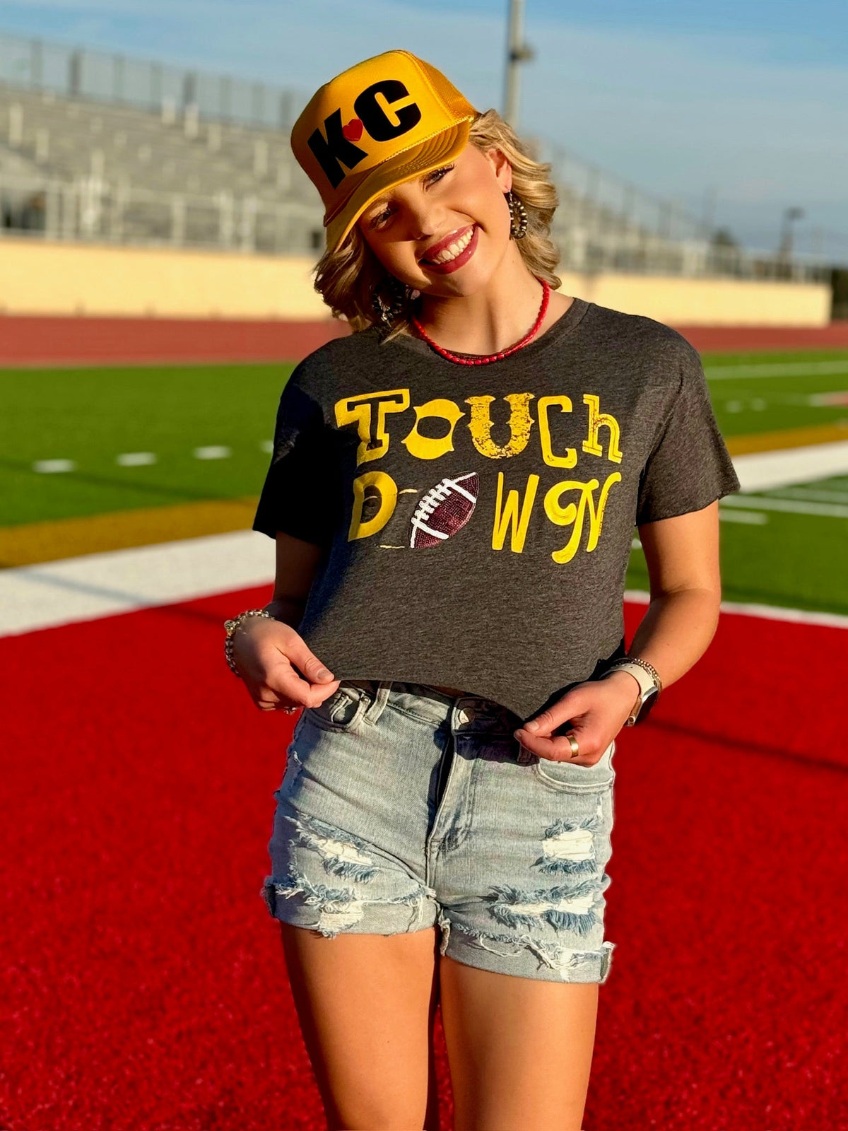 Gold Touchdown with Sequin Football by Randi Mahomes