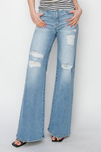 Risen High-Rise Wide Distressed Western Jeans — Light Wash Playful Distressing with Wide-Leg Cut
